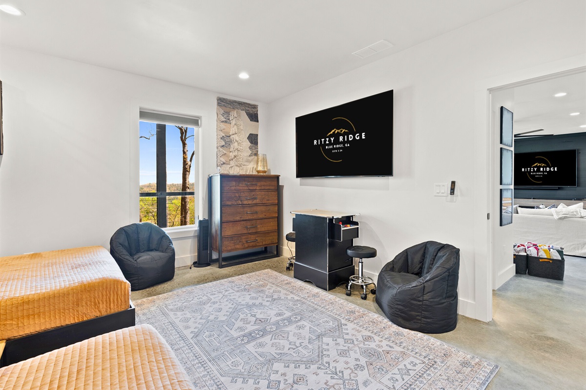 Game on! Get your arcade fix right in the bunk bedroom, where classic fun meets modern comfort.