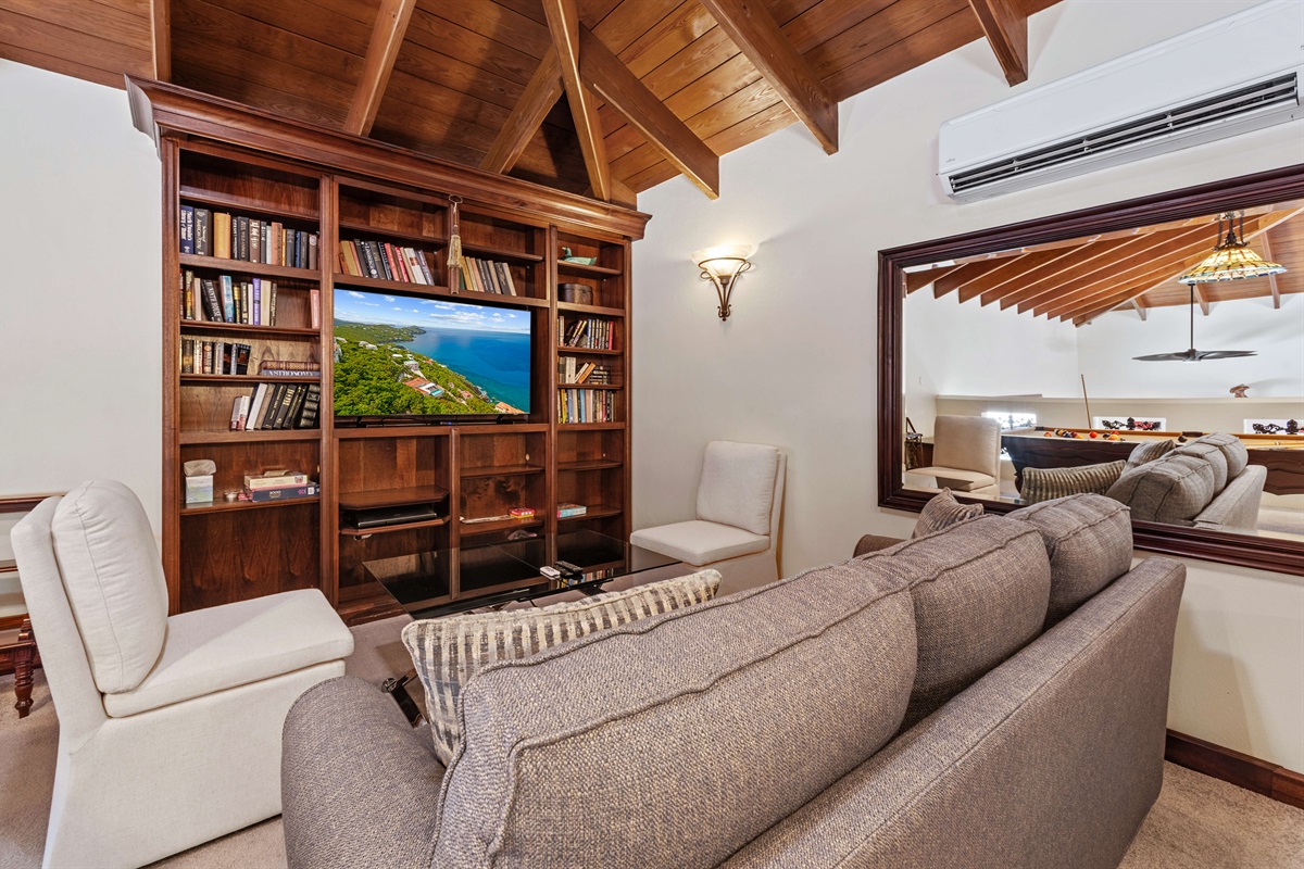 The big screen TV is perfect for watching games or a movie night.