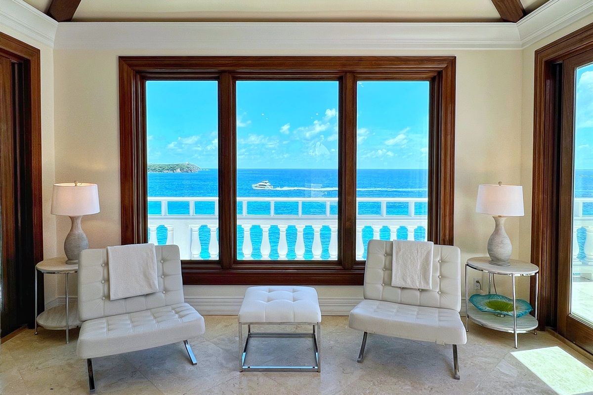 The living area seamlessly connects to outdoor spaces for breezy evenings.