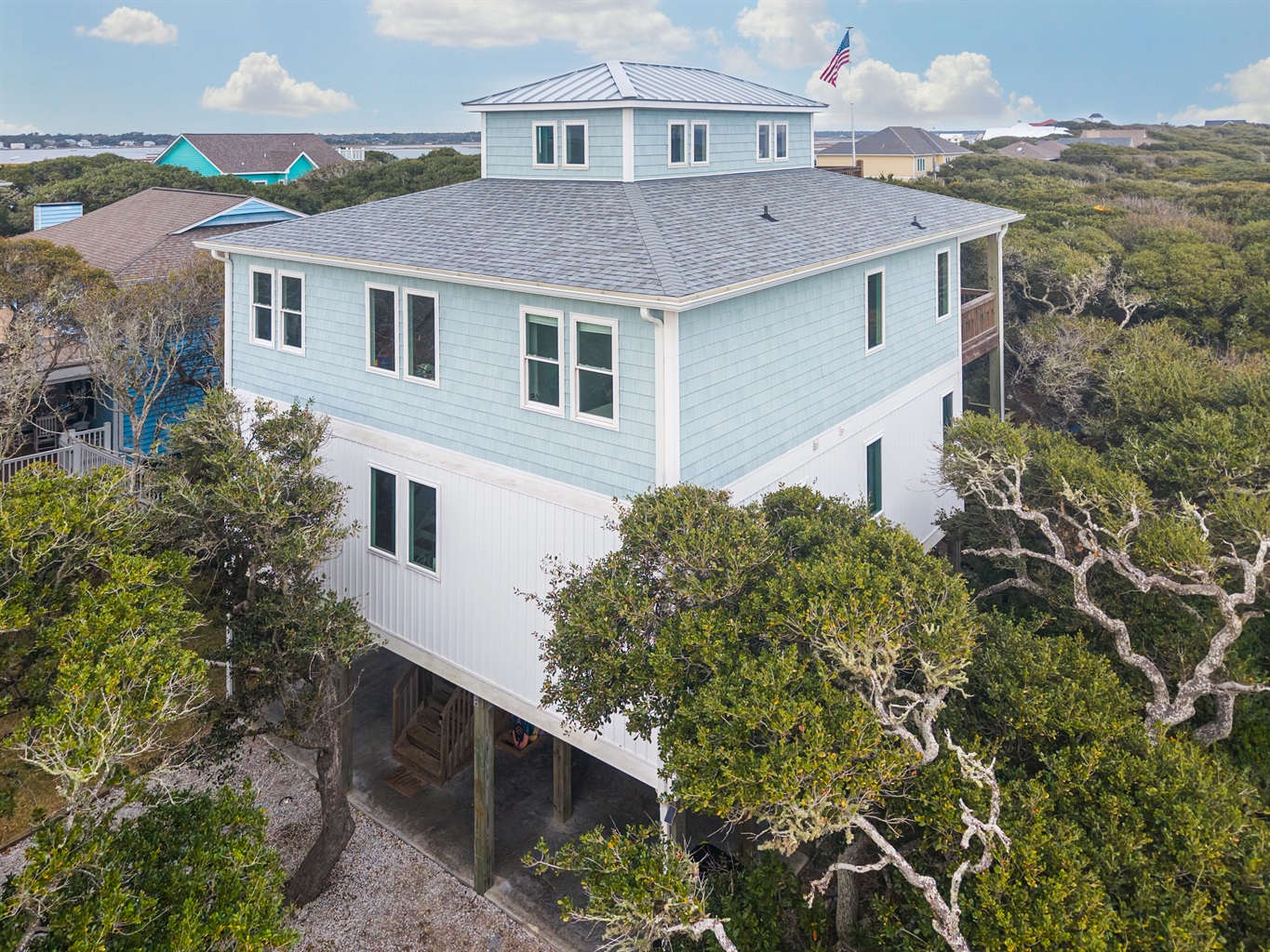 Your private beach escape, shaded by majestic oaks