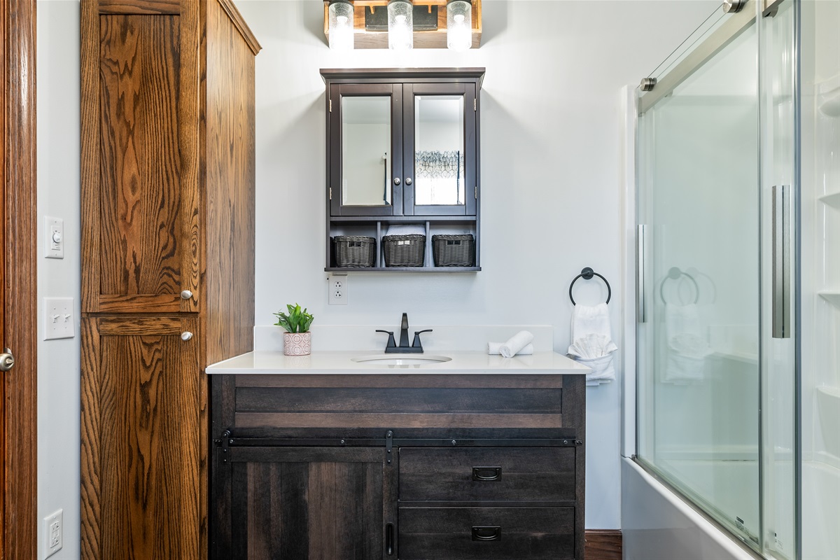 Contemporary bathroom with sleek vanity and glass shower—spa-inspired comfort.