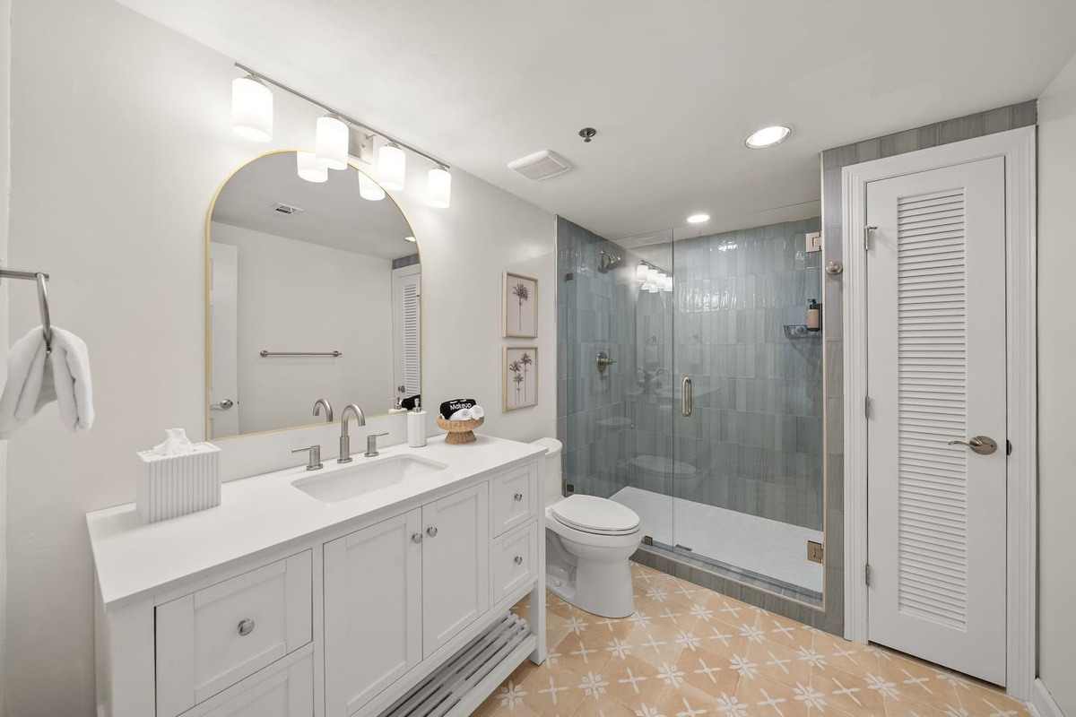 Brand new, fully remodeled primary suite with stunning tile floor and shower.  Terra Pure Spa Collection Shampoo, conditioner, and body wash provided.
