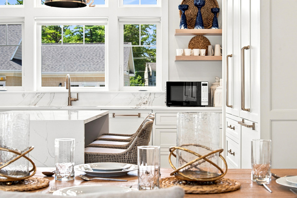 Thoughtful coastal details and an elegant dining setup create the perfect backdrop for memorable meals.