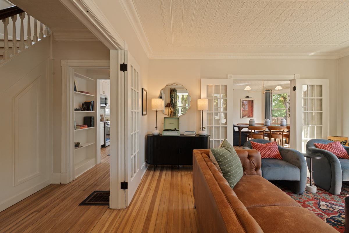 Original character meets a fresh, comfortable design. The open flow between the living and dining spaces makes it easy to spend time together while still giving everyone room to spread out.