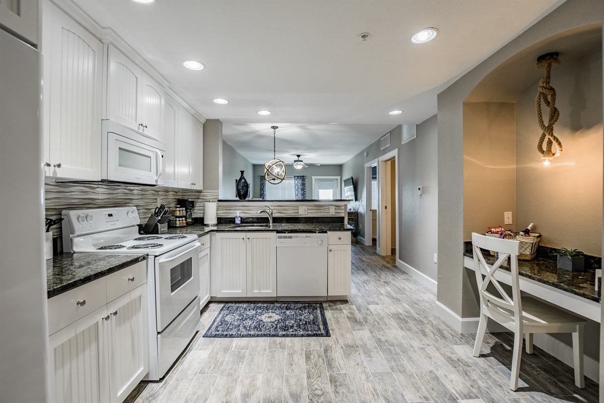 View from entrance- a fully stocked kitchen