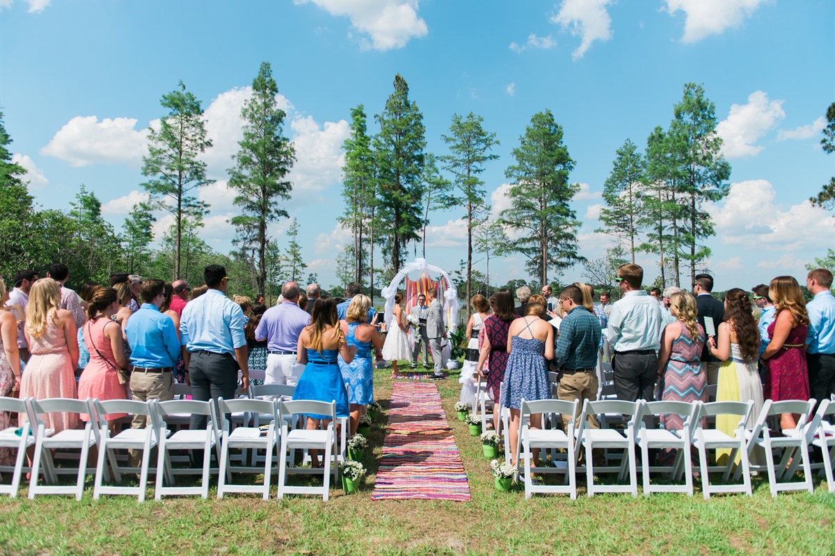 Lakeside ceremony at Clermont waterfront estate venue