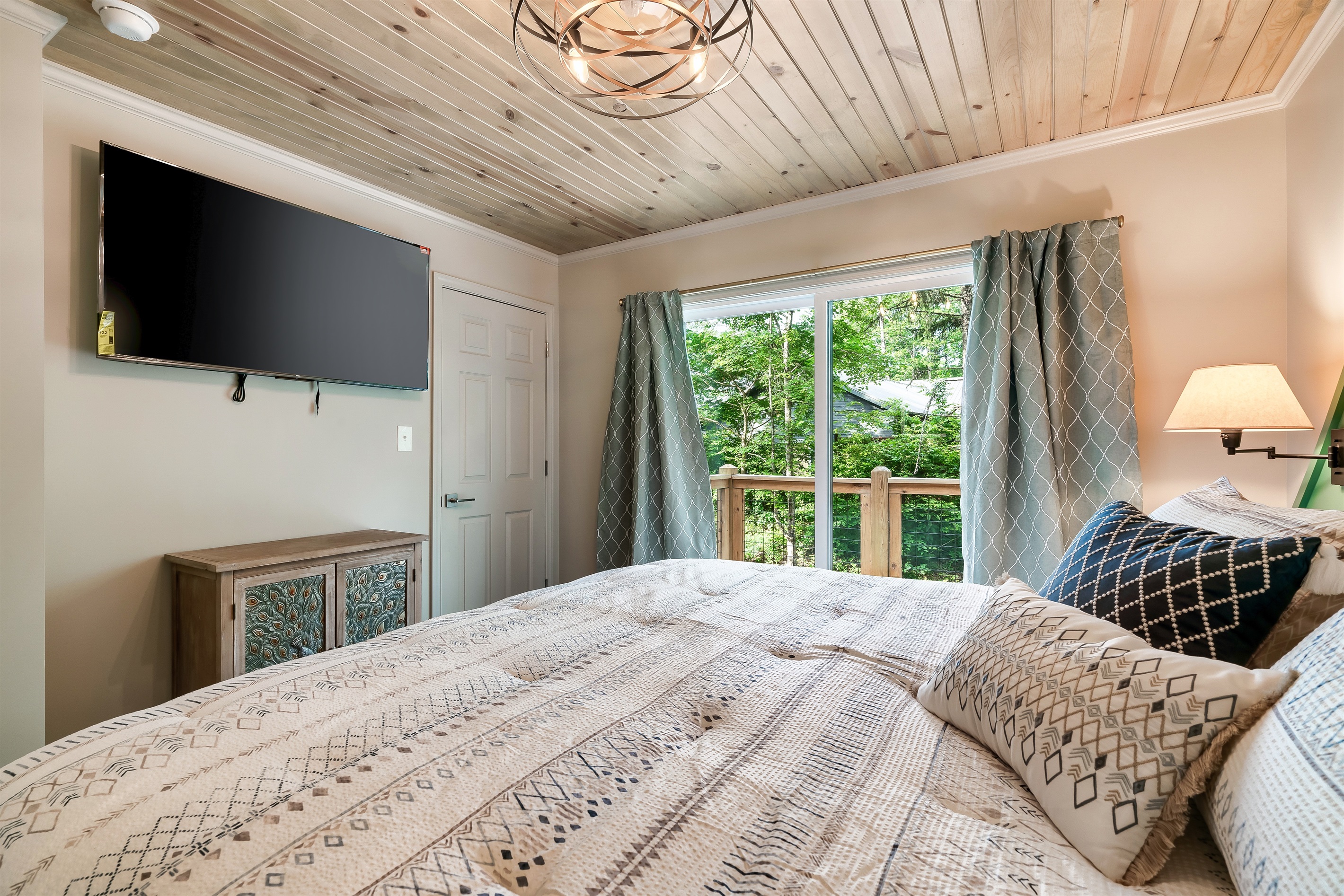 Comfort with a view. Enjoy your favorite shows from the plush King bed, then step out onto your private outdoor space.
