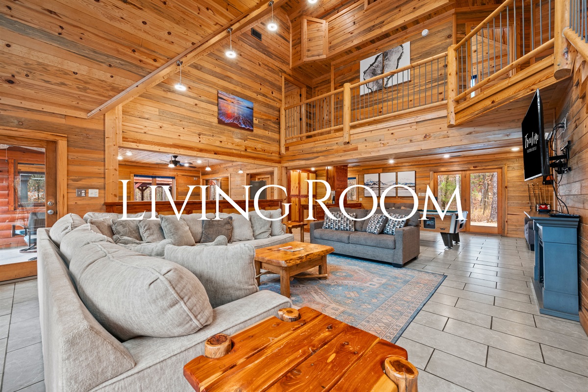 Designed with comfort in mind, the main living room offers plenty of seating for groups to gather and unwind together.