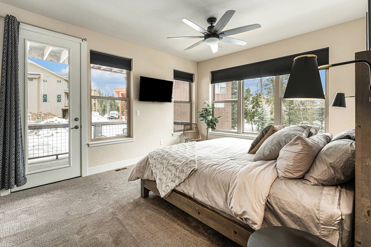 Master BR - A king sized bed in a spacious bedroom, with a full bath and a private deck
