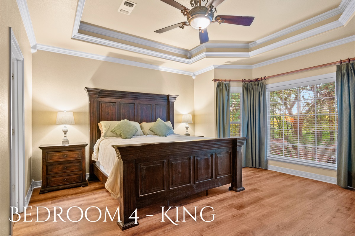 Bedroom 4 with king bed and elegant design.