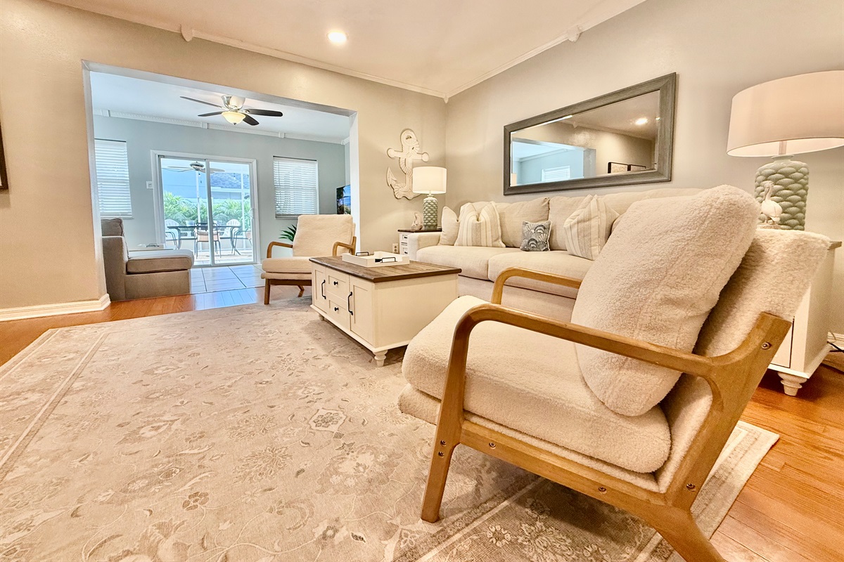 Clean lines, subtle textures, and thoughtful decor come together in this inviting space ideal for unwinding after a day at the beach.
