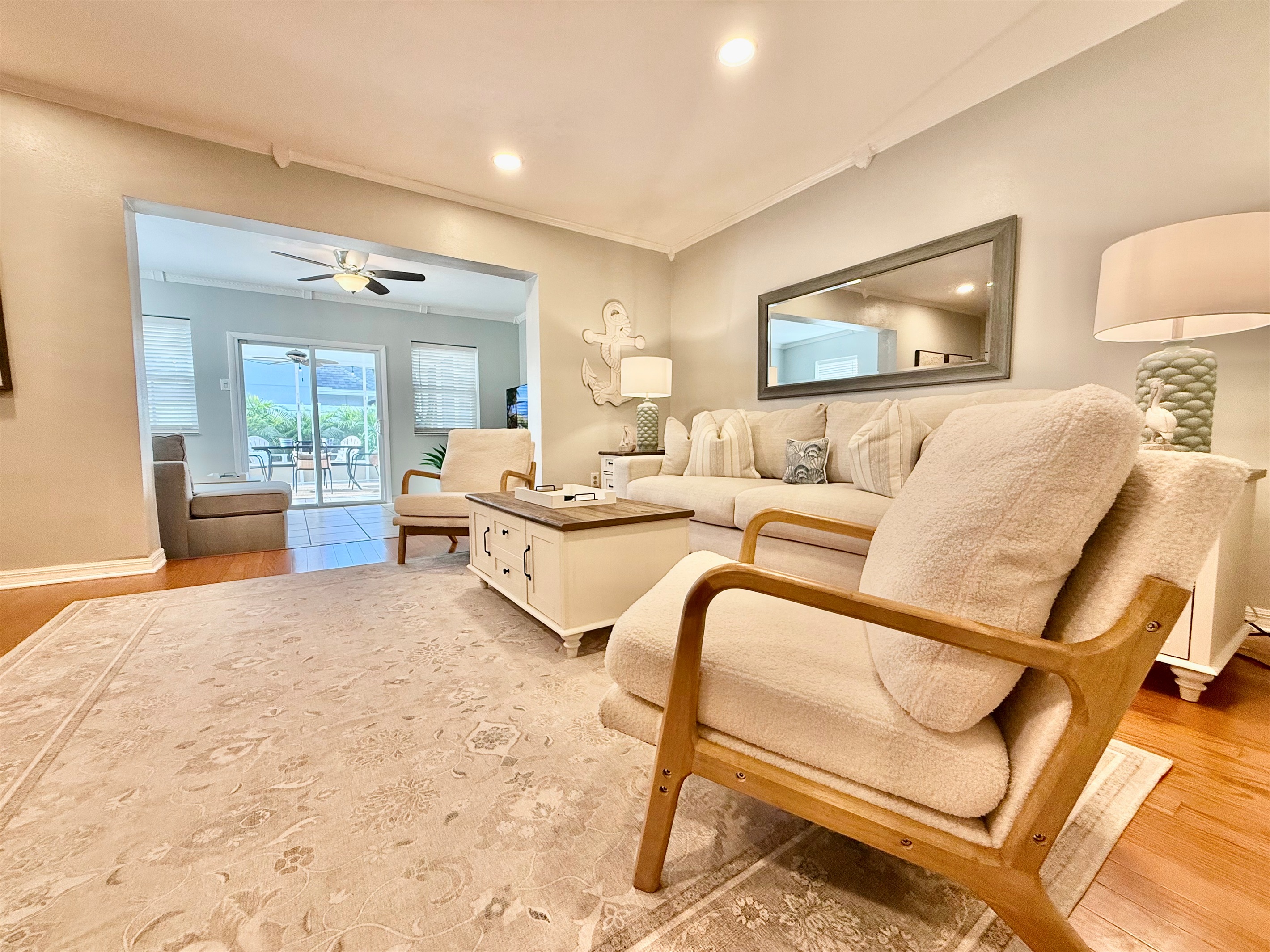 Clean lines, subtle textures, and thoughtful decor come together in this inviting space ideal for unwinding after a day at the beach.