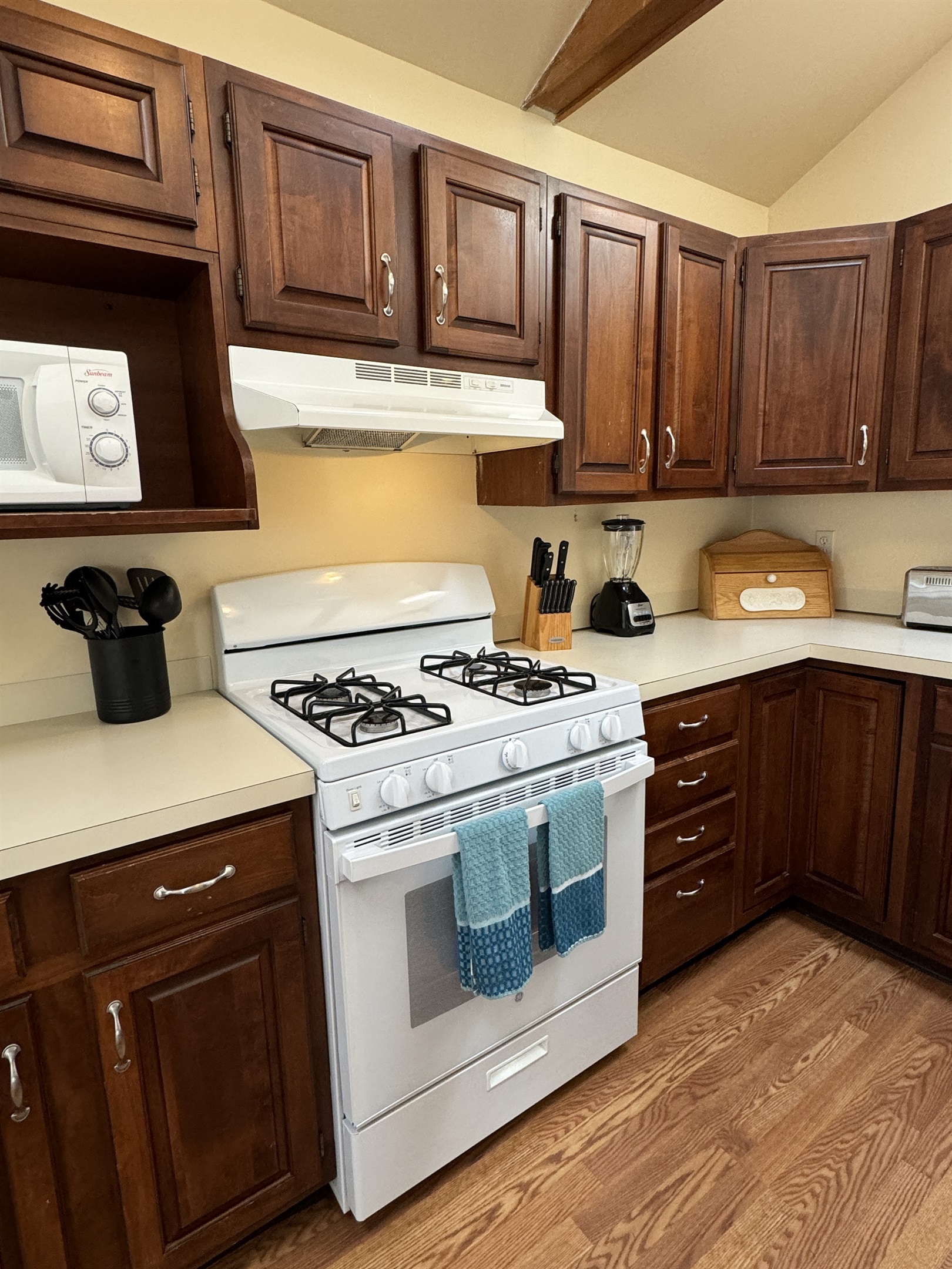Cooperstown Cottage kitchen with a gas stove and plenty of counter space for prep.