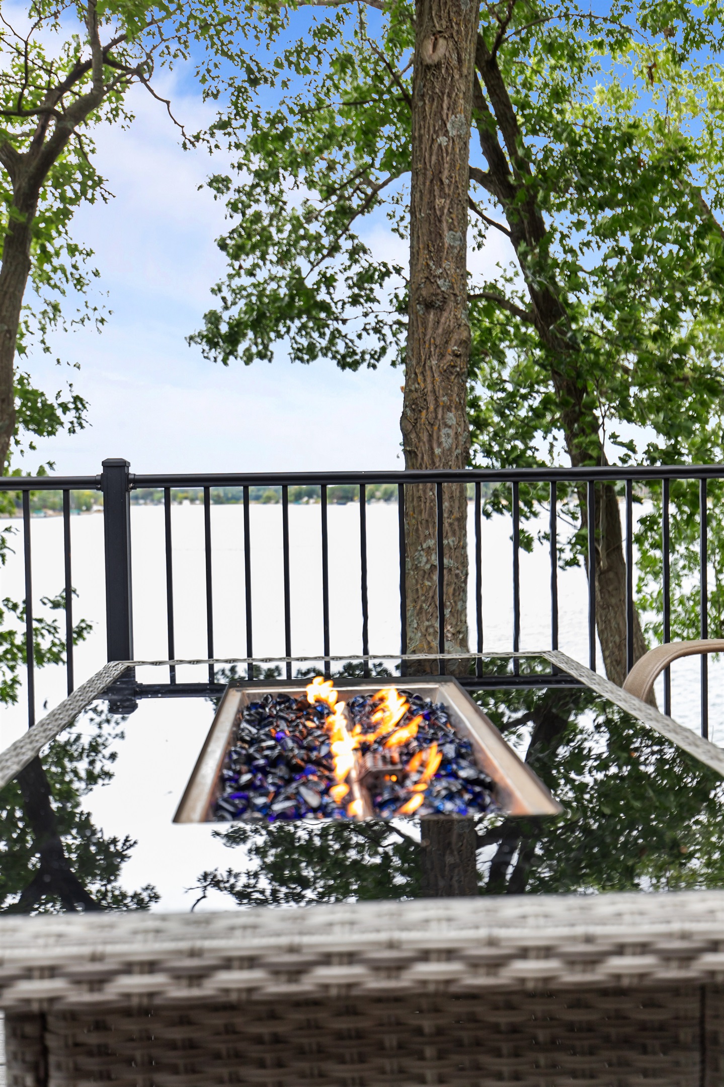 Cozy up by the fire with stunning lake views.