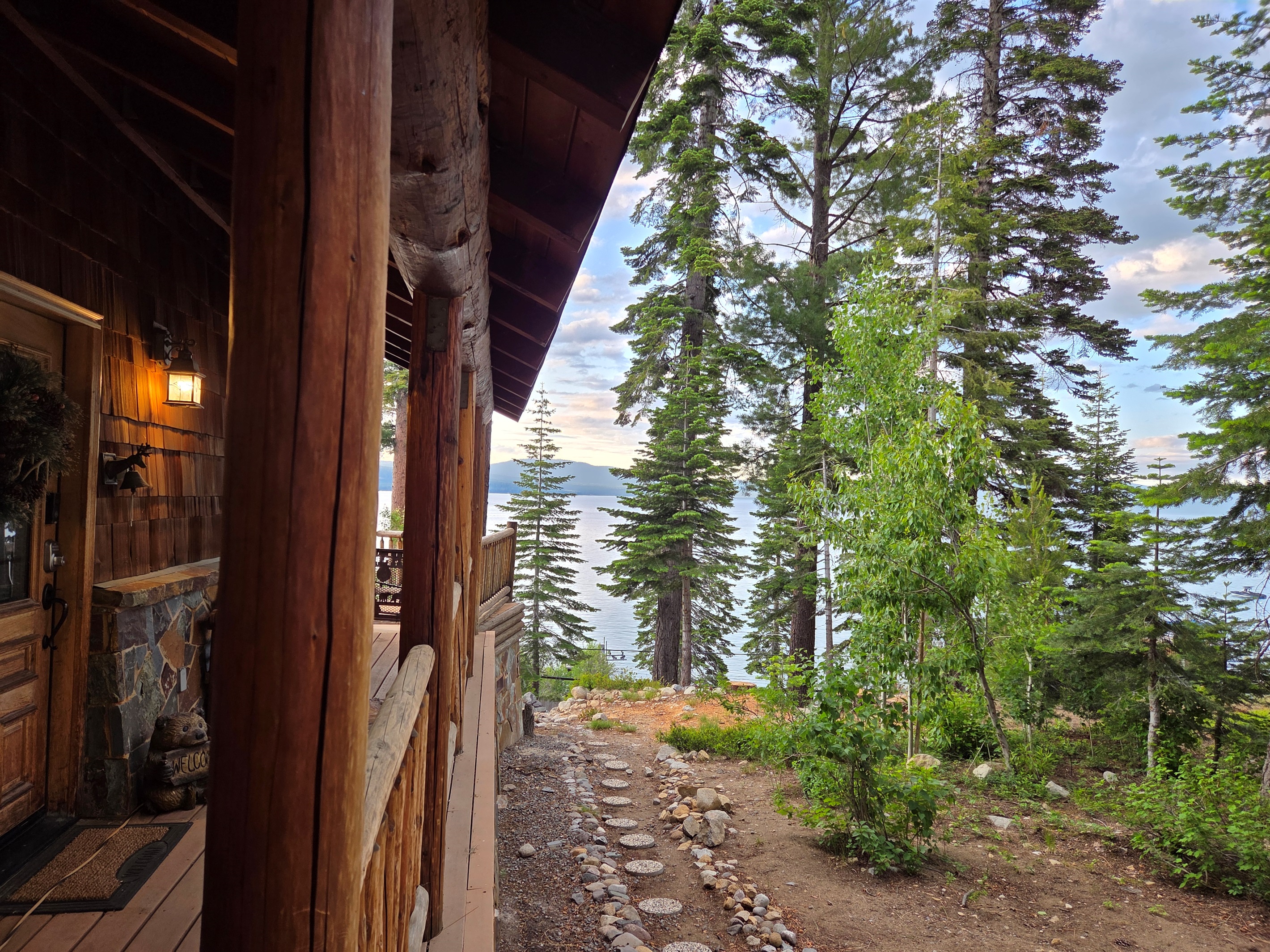 Our side yard, front door and view of the lake.