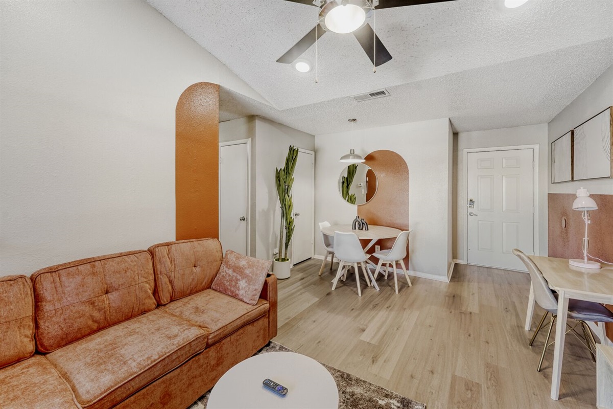 Stylish retro charm meets modern comfort in this cozy living space.