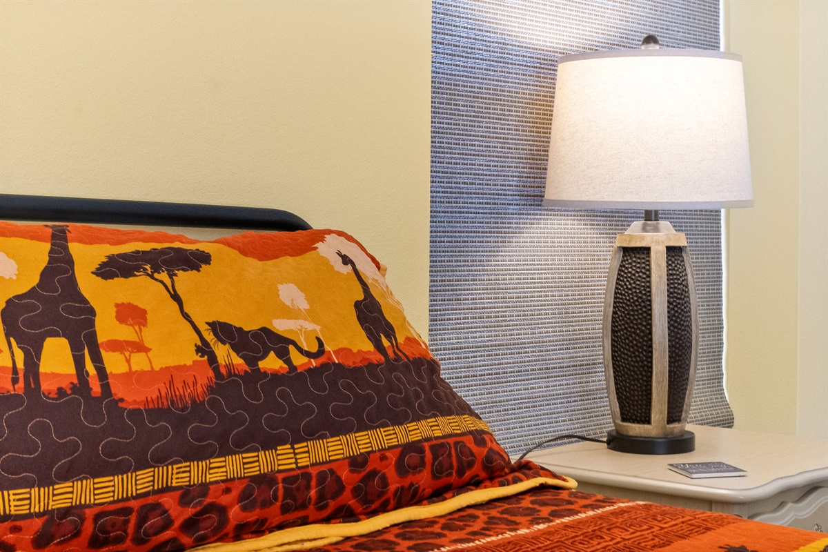 All of our beds feature quilts for Florida comfort. The lamps have USB ports for charging.