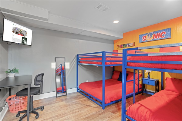 Arrange an entertaining group retreat in our bedroom featuring two bunk beds, accommodating four guests comfortably, and a smart TV for endless amusement.