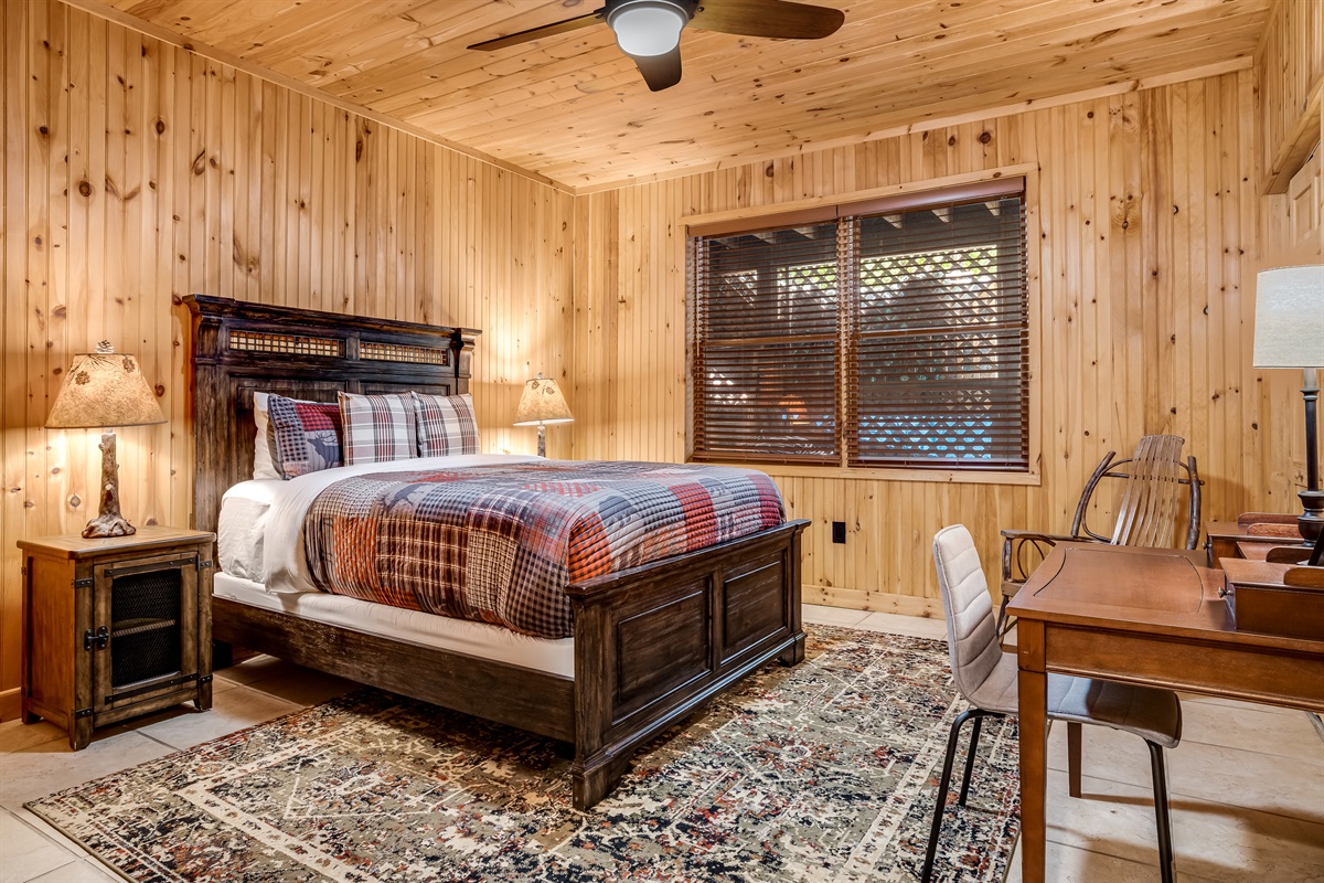 Lower level bedroom with queen bed