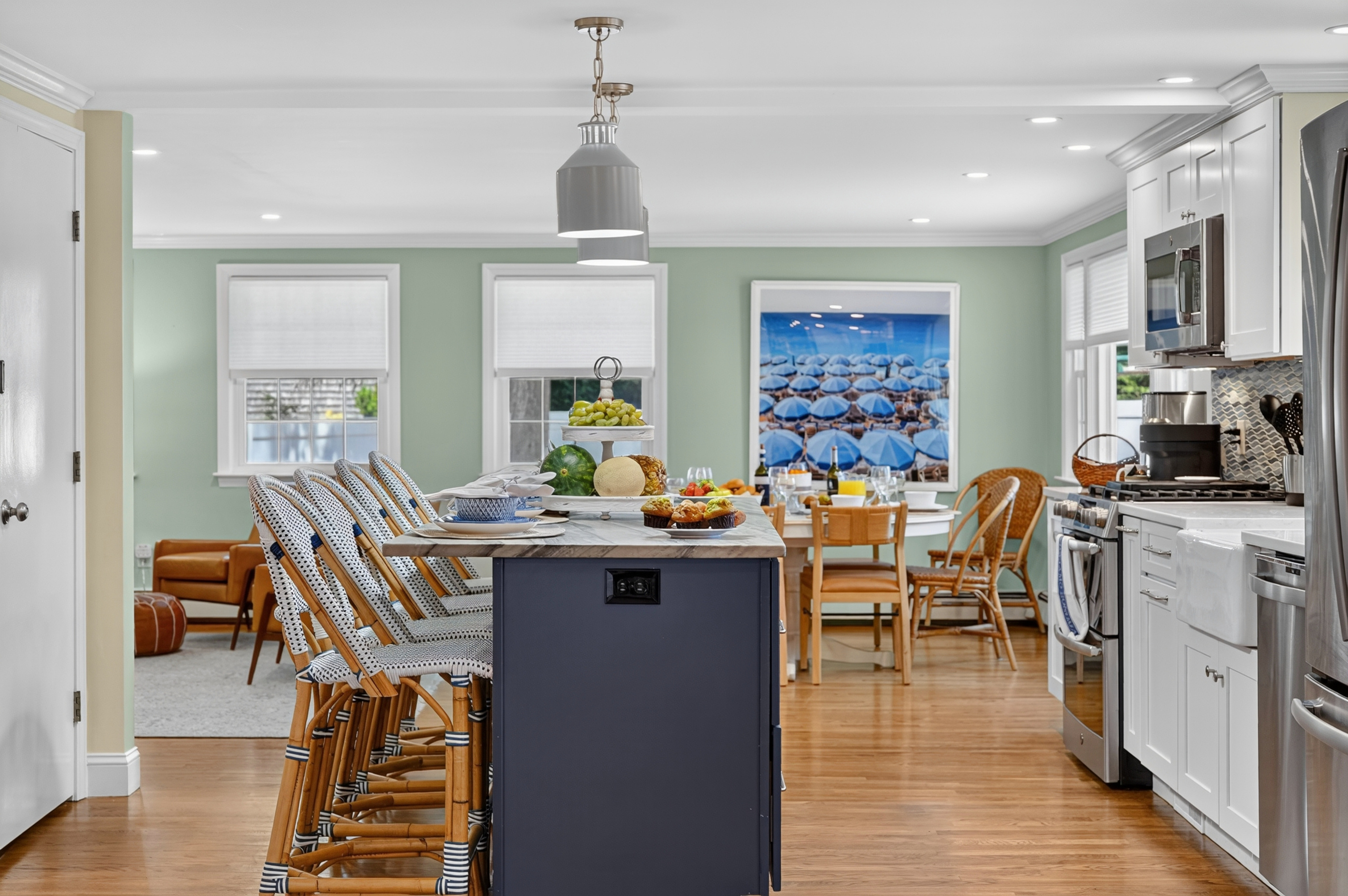 Modern kitchen finishes with scenic backyard views from the sink.