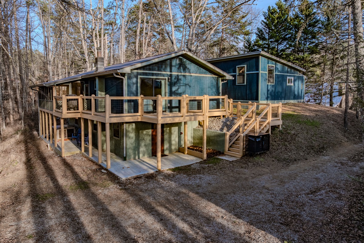 Multiple outdoor zones, from the sun-drenched upper deck to the shaded lower patio, provide endless options for relaxation.