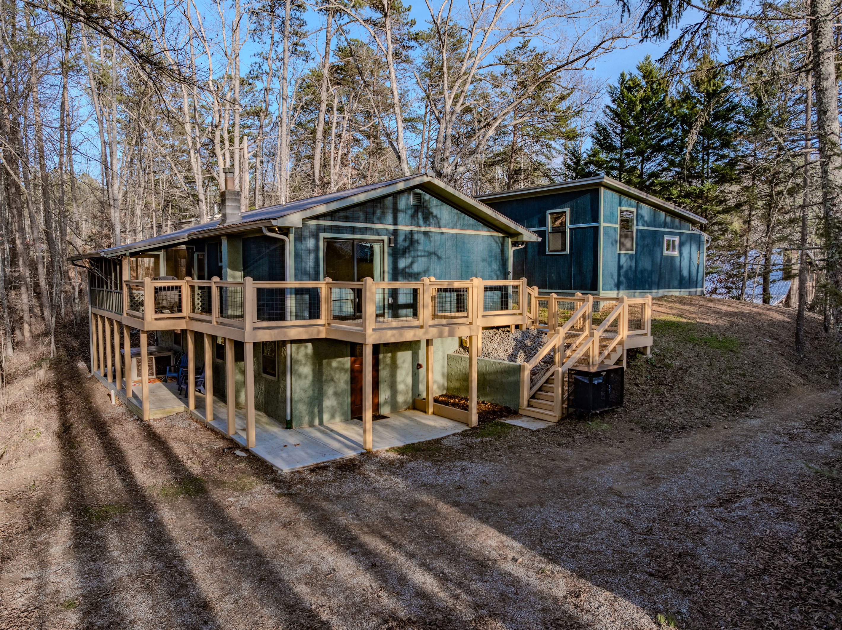 Multiple outdoor zones, from the sun-drenched upper deck to the shaded lower patio, provide endless options for relaxation.