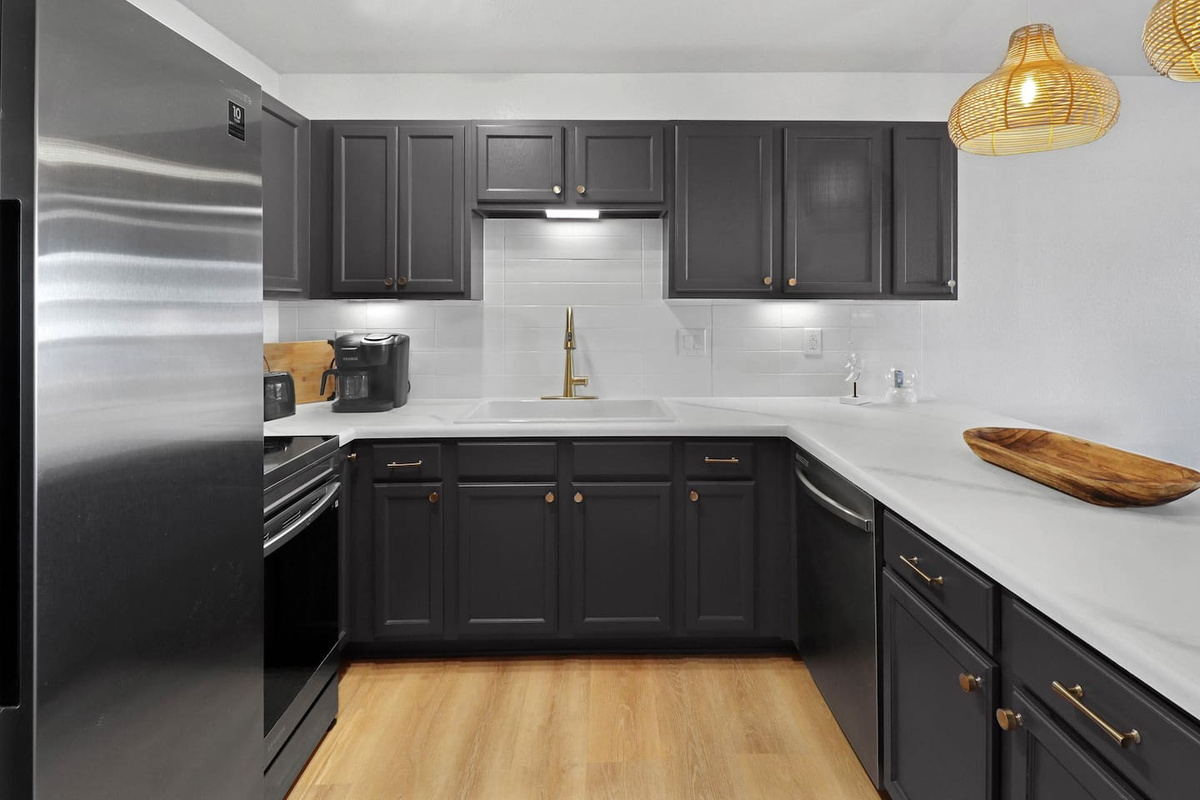 Cook a real meal with stainless steel appliances and updated surfaces &mdash; the kitchen is fully stocked and ready.