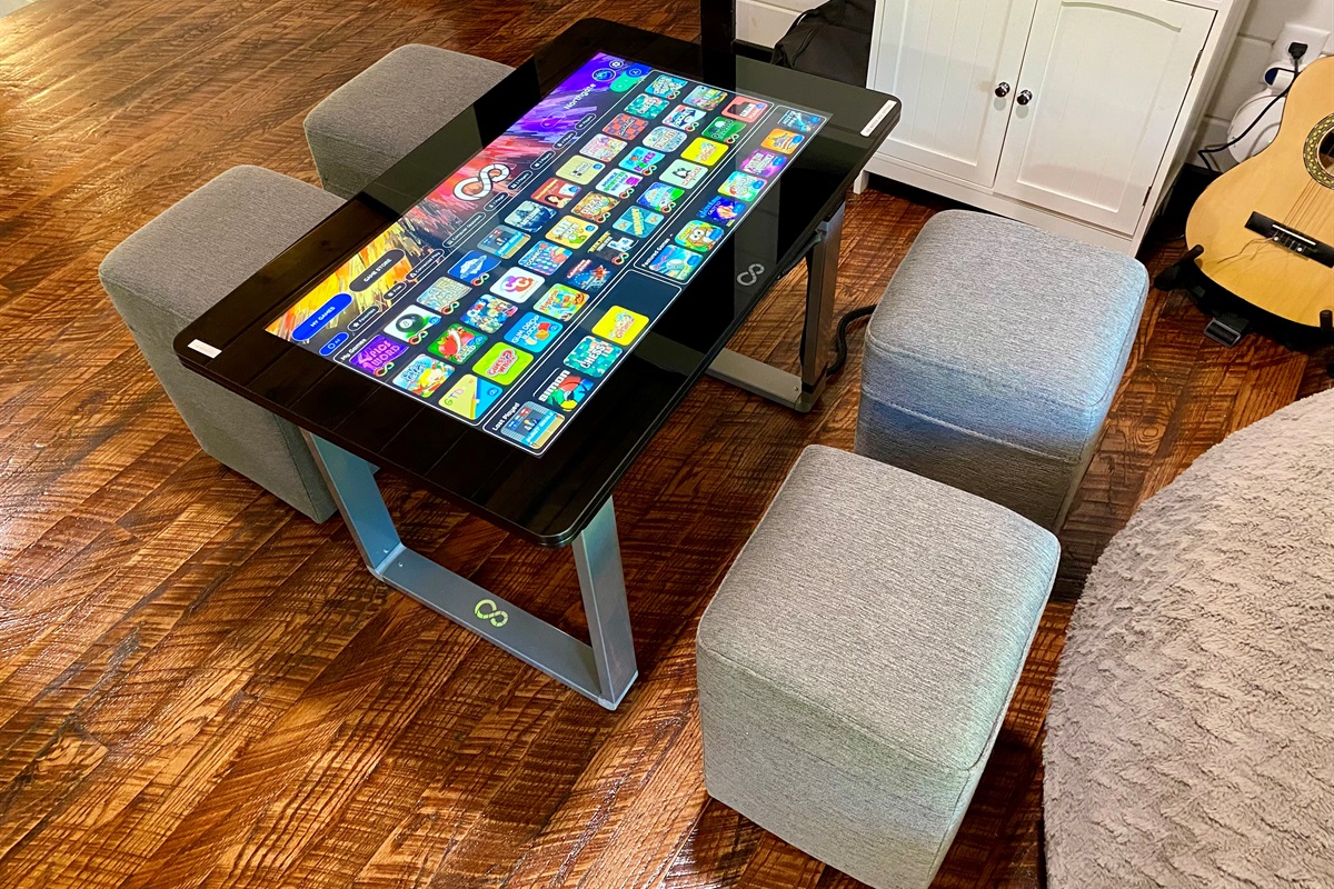 Our infinity game table is packed with classic board games, card games, puzzles, and more—all in one sleek, touchscreen device is great for family game night.