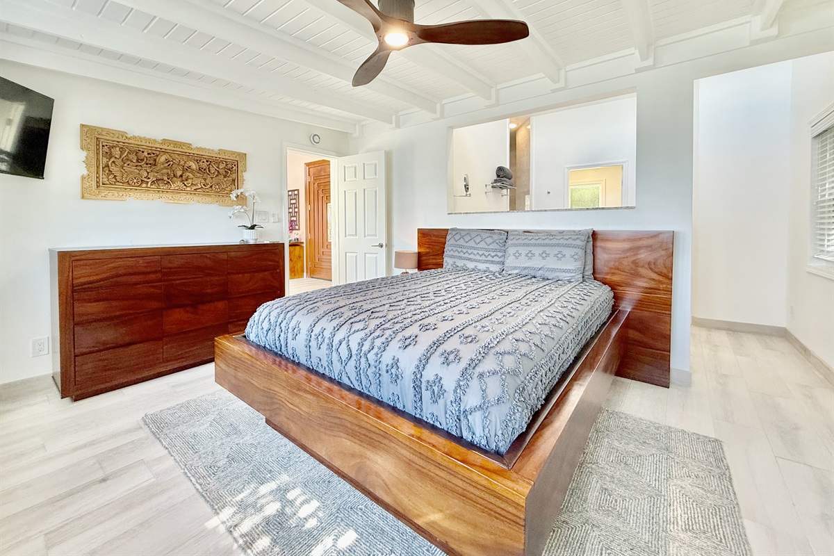 This suite features a queen bed, stunning views, and a spacious bathroom.