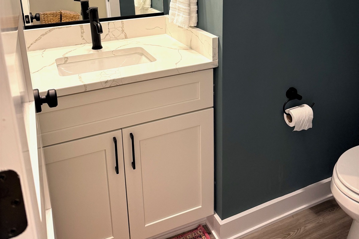 Half bath downstairs by entry