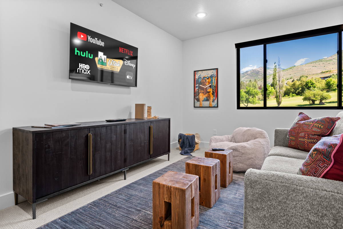 The upstairs media and bunk room provides additional space to relax and recharge.