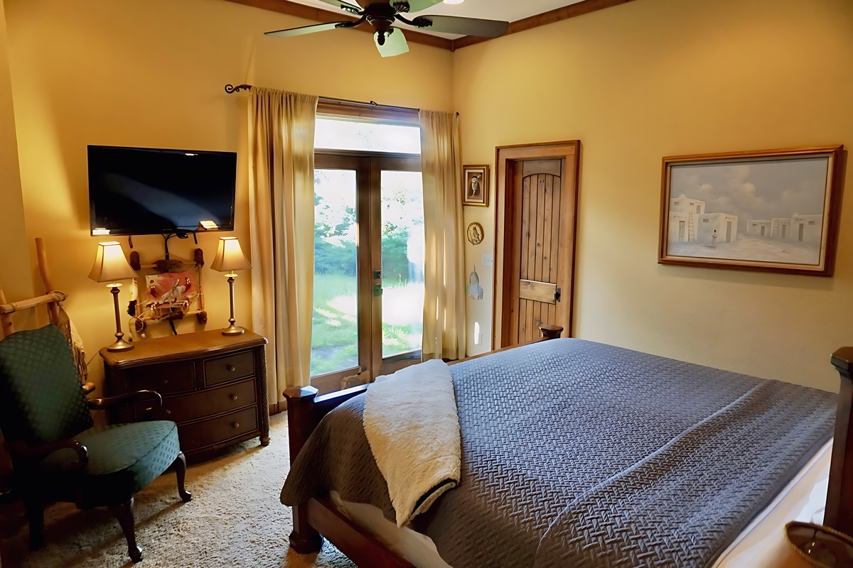 Cozy and inviting bedroom with a private balcony to enjoy the fresh air.