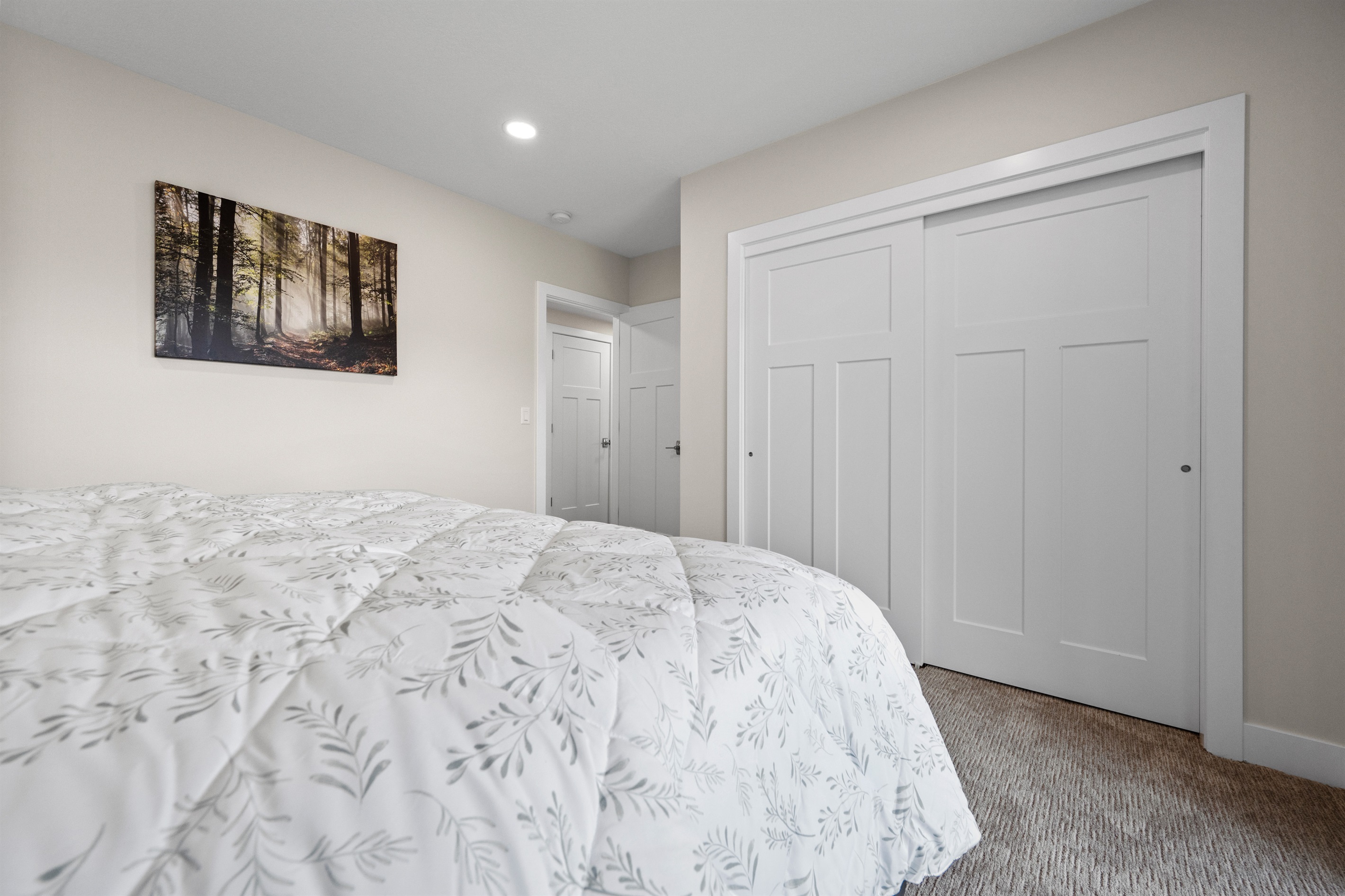 This king bedroom has a large double closet.