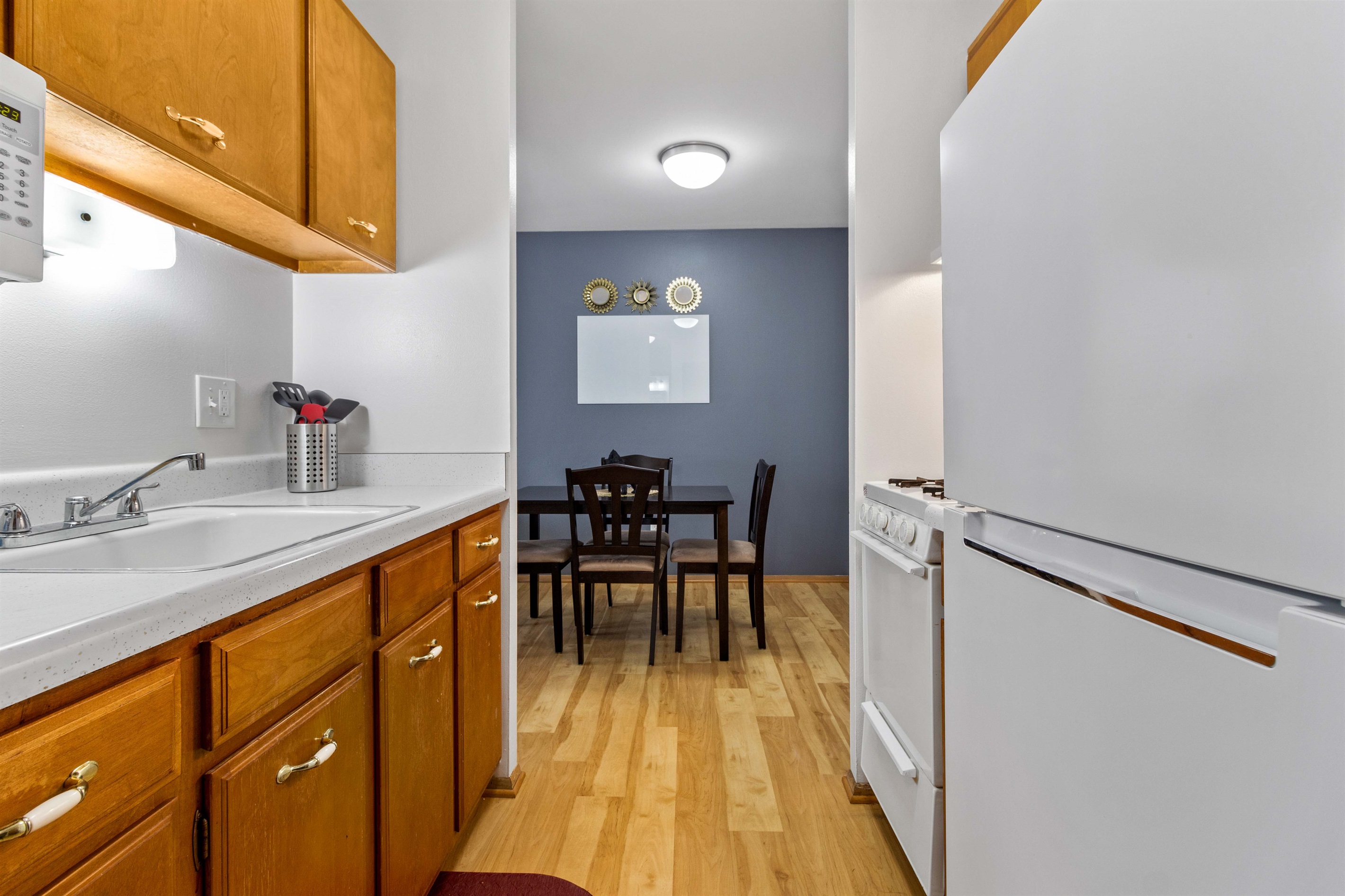 Whiteboard in the dining room. Dry erase markers are on the office desk.