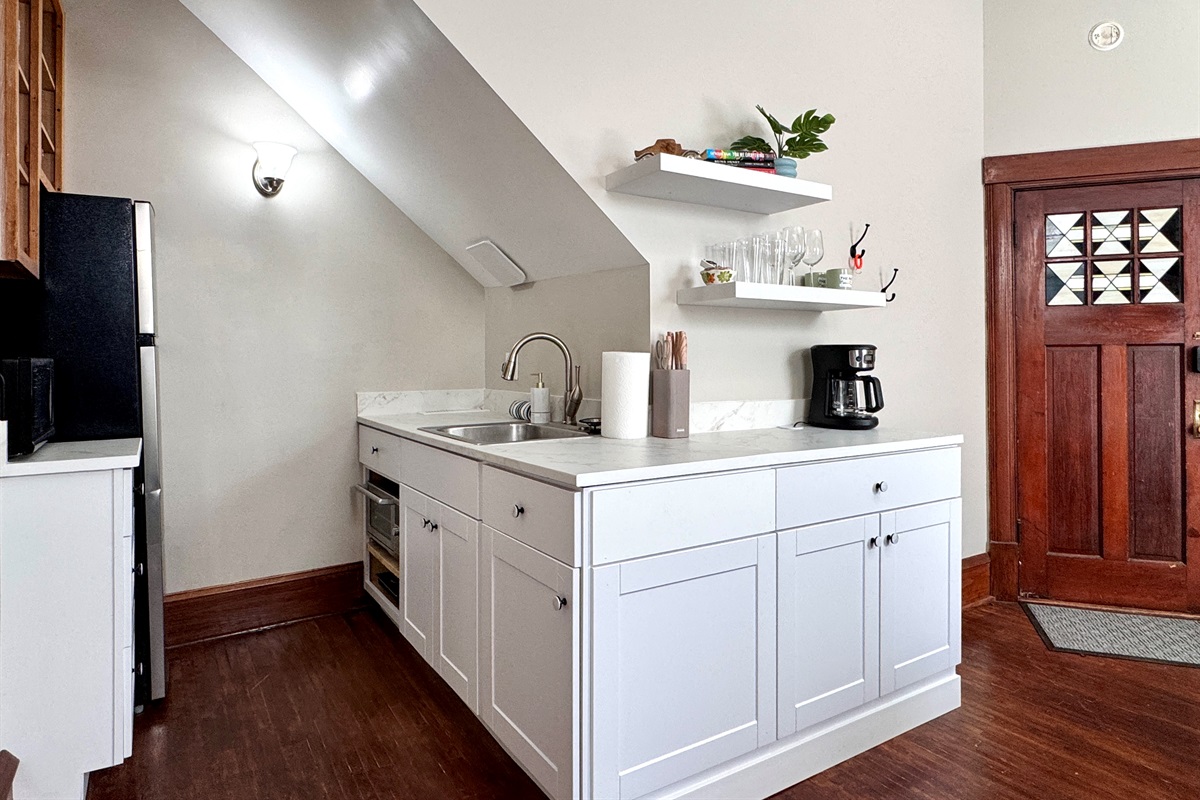 Two burner cook top and large air fryer/oven for all of your baking needs.