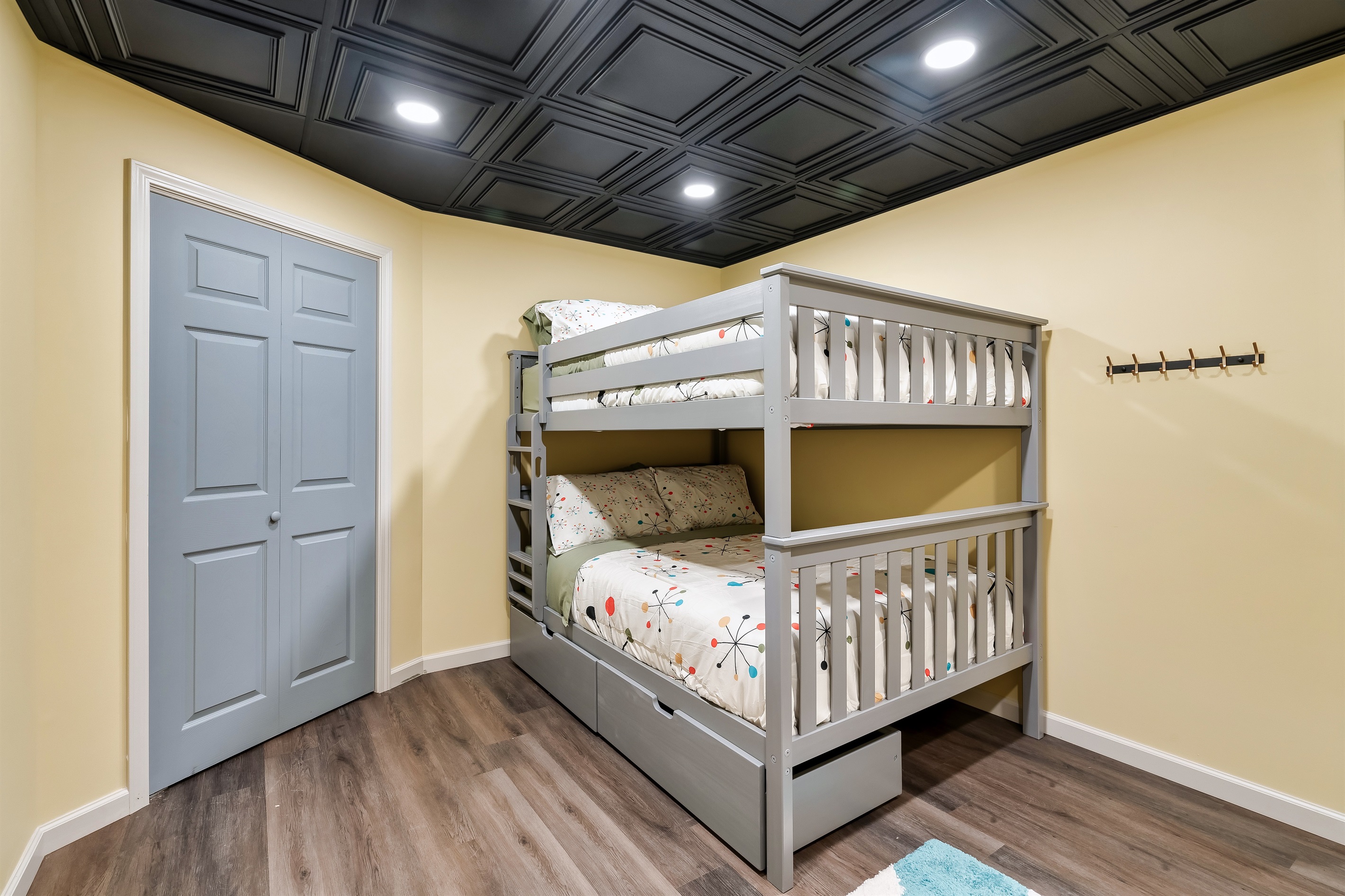 More than just a room! A great hangout for kids and adults alike, featuring soft lighting, closet space, and modern design.