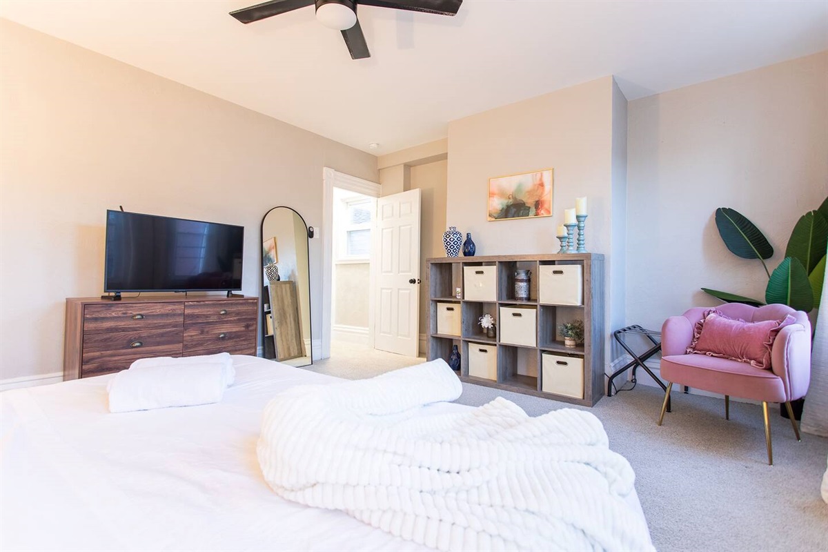 In the King Bedroom, store your belongings in the dresser and cubbies with baskets in the cube storage unit.