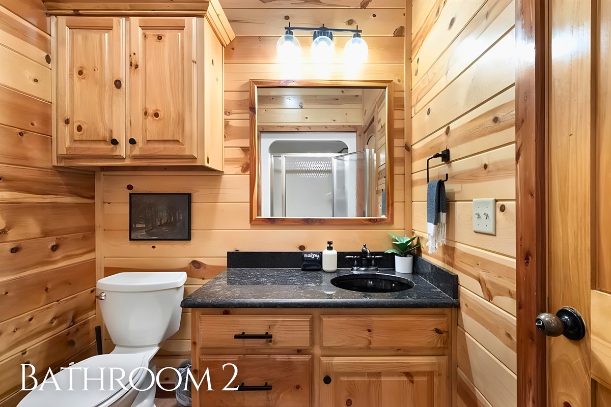 Conveniently located, the second bathroom serves the bedrooms with ease.