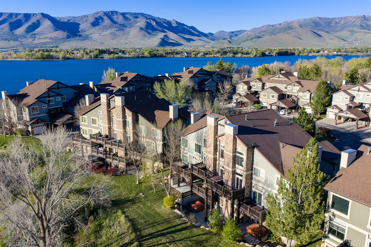 Incredible aerial perspective showcasing the home’s prime location near Pineview Reservoir.