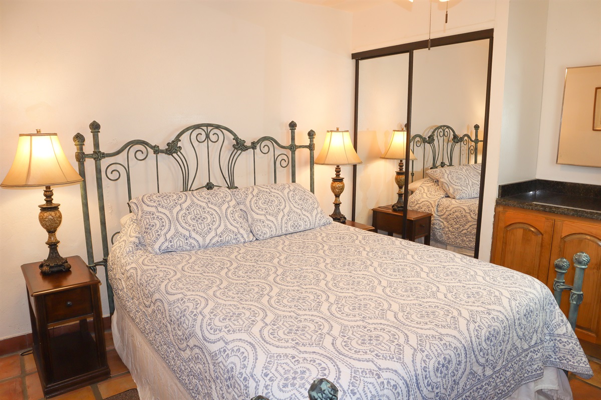 Circa Del Mar - Downstairs Bedroom 4 (North East) with a Queen bed with Wesley Allen headboard and open-toe foot posts.