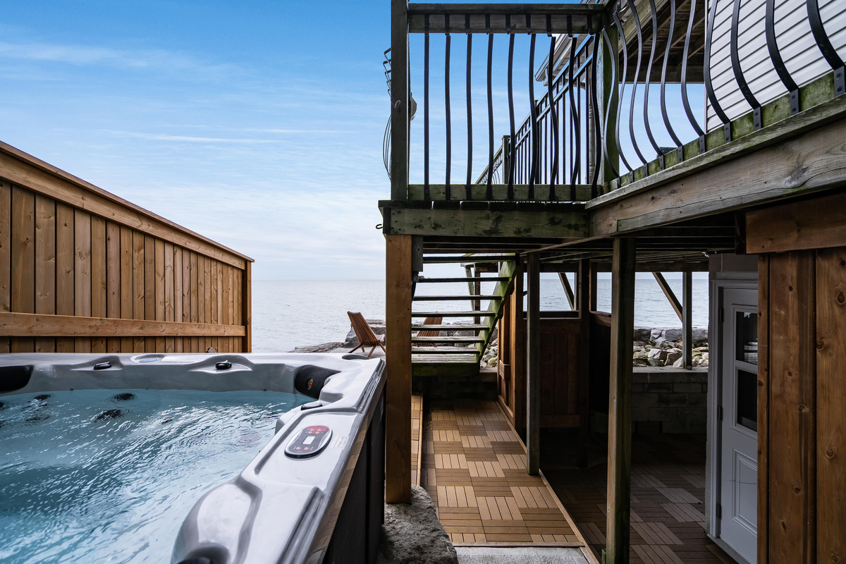 Hot tub and multi-level deck with convenient access to the home.