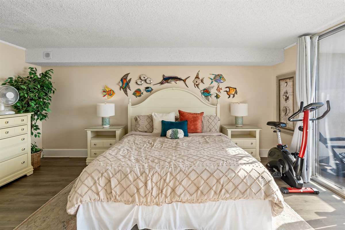 Spacious Main Bedroom with King bed and balcony access