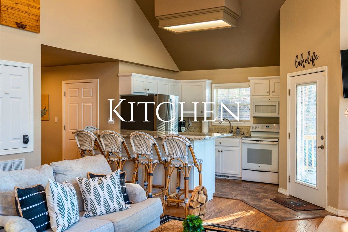 The kitchen&rsquo;s bar seating keeps everyone connected, whether you&rsquo;re cooking, snacking, or catching up between activities.