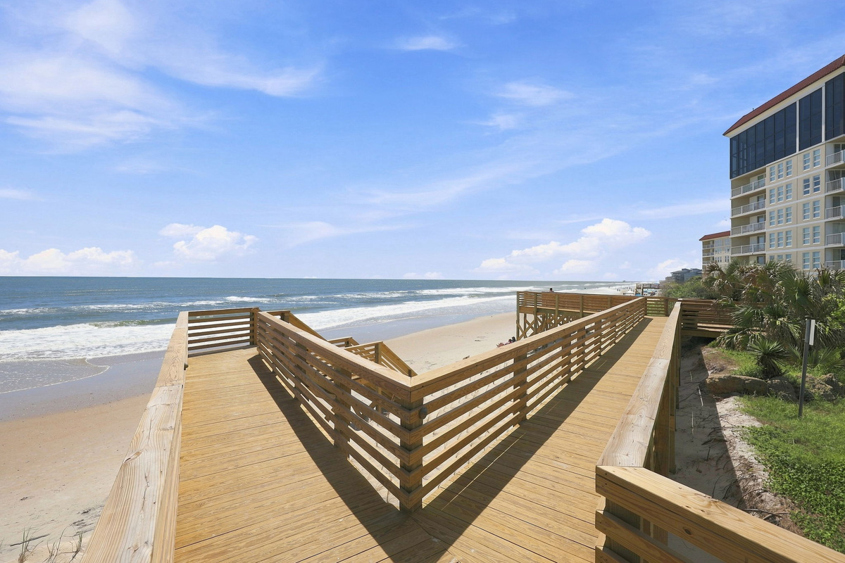 Step outside and follow this elevated boardwalk straight to the sand and surf.