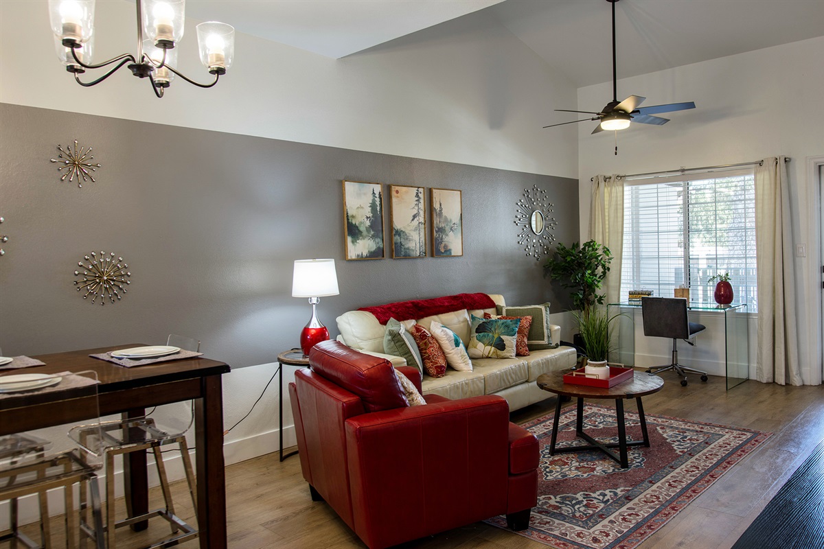 Open floor plan flows seamlessly from living room to kitchen.