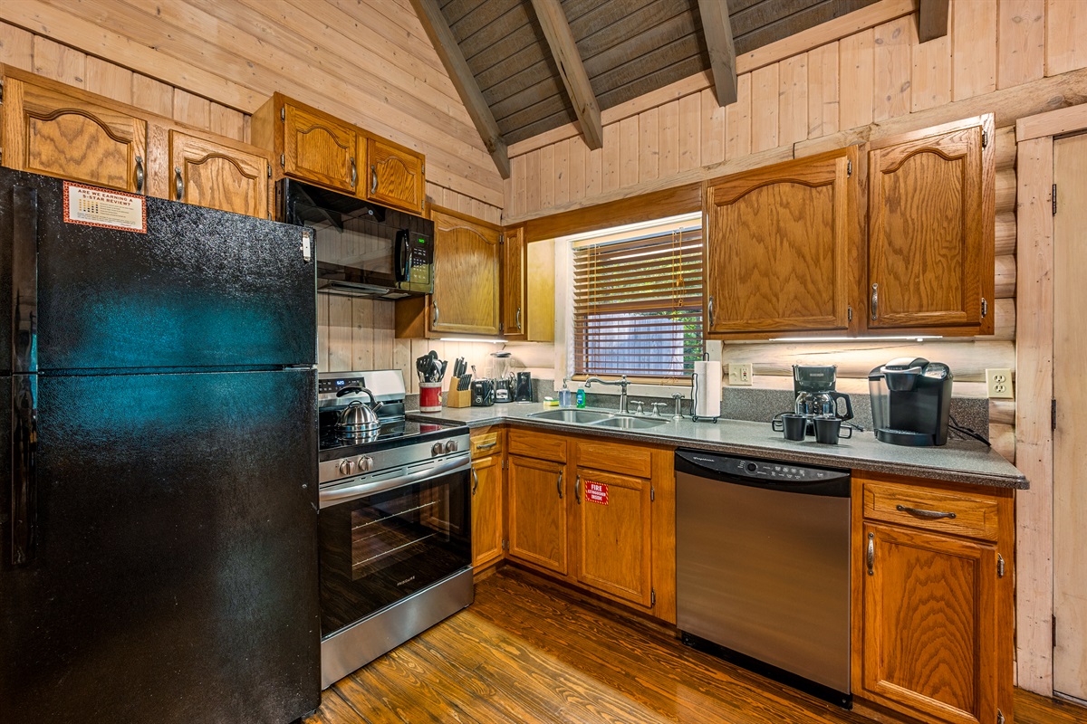 Enjoy home-cooked meals in this well-equipped kitchen with coffee makers!