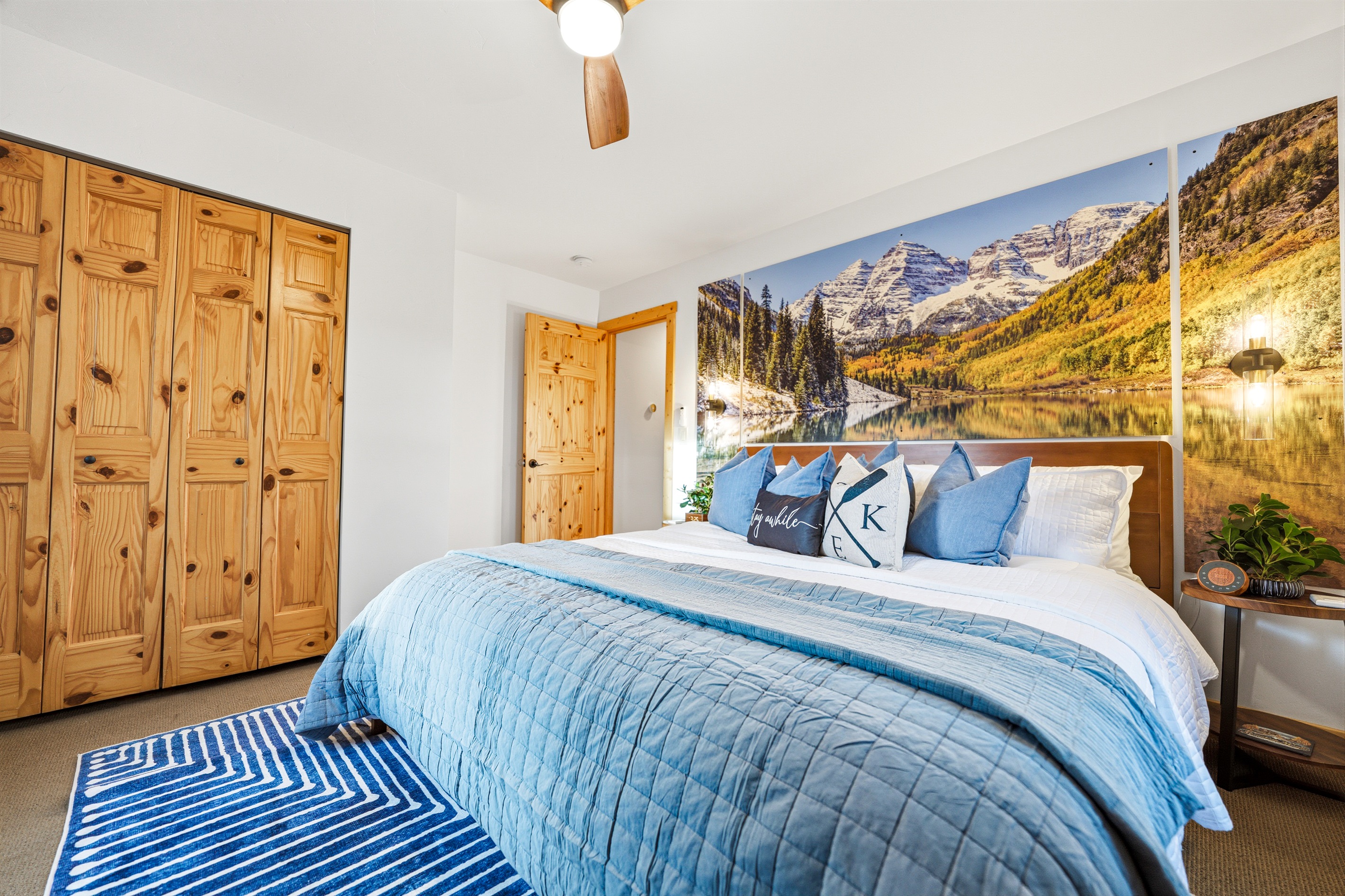 This room with it's king bed and plush linens is your quiet retreat after a day of adventure—cool, calm, and inviting.
