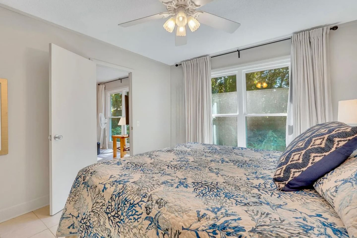 Bedroom with bright windows