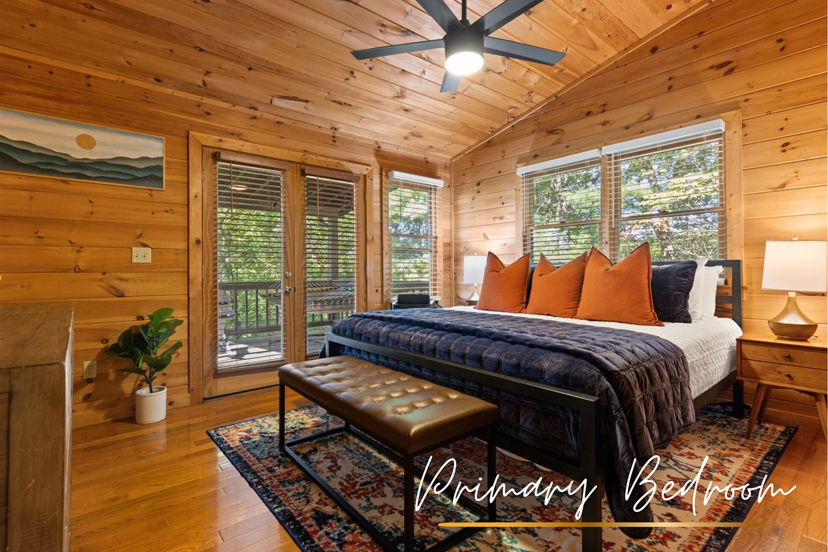 The primary king suite blends wood charm with blue accents.