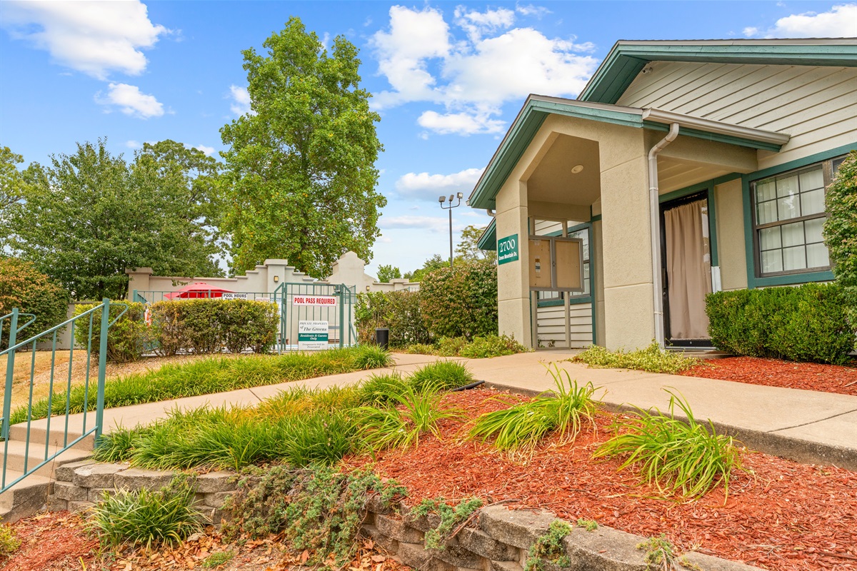 Pool-area entry and grounds add to the relaxed resort feel while keeping you close to the heart of town.